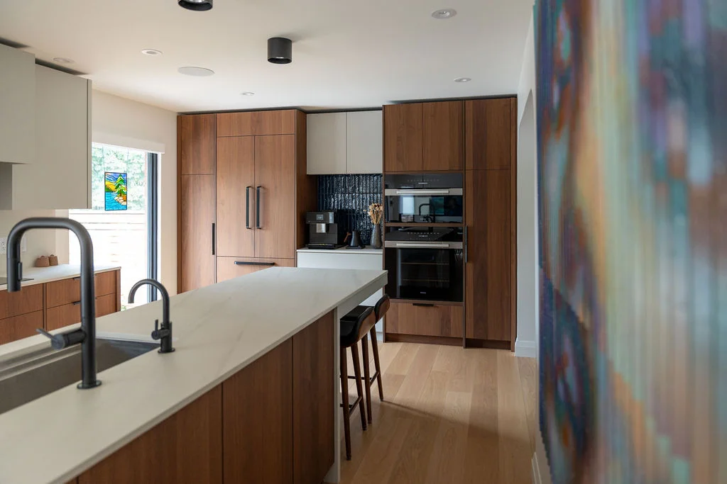 open view of counter and cabinets of kitchen