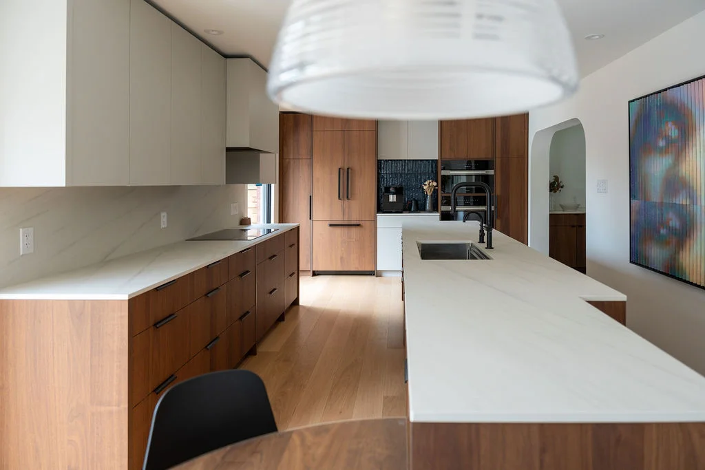 open view of counter and cabinets of kitchen
