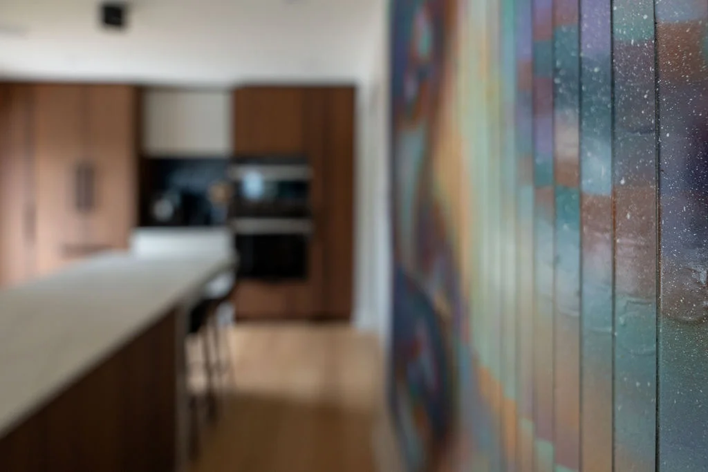 wall decor leading to kitchen