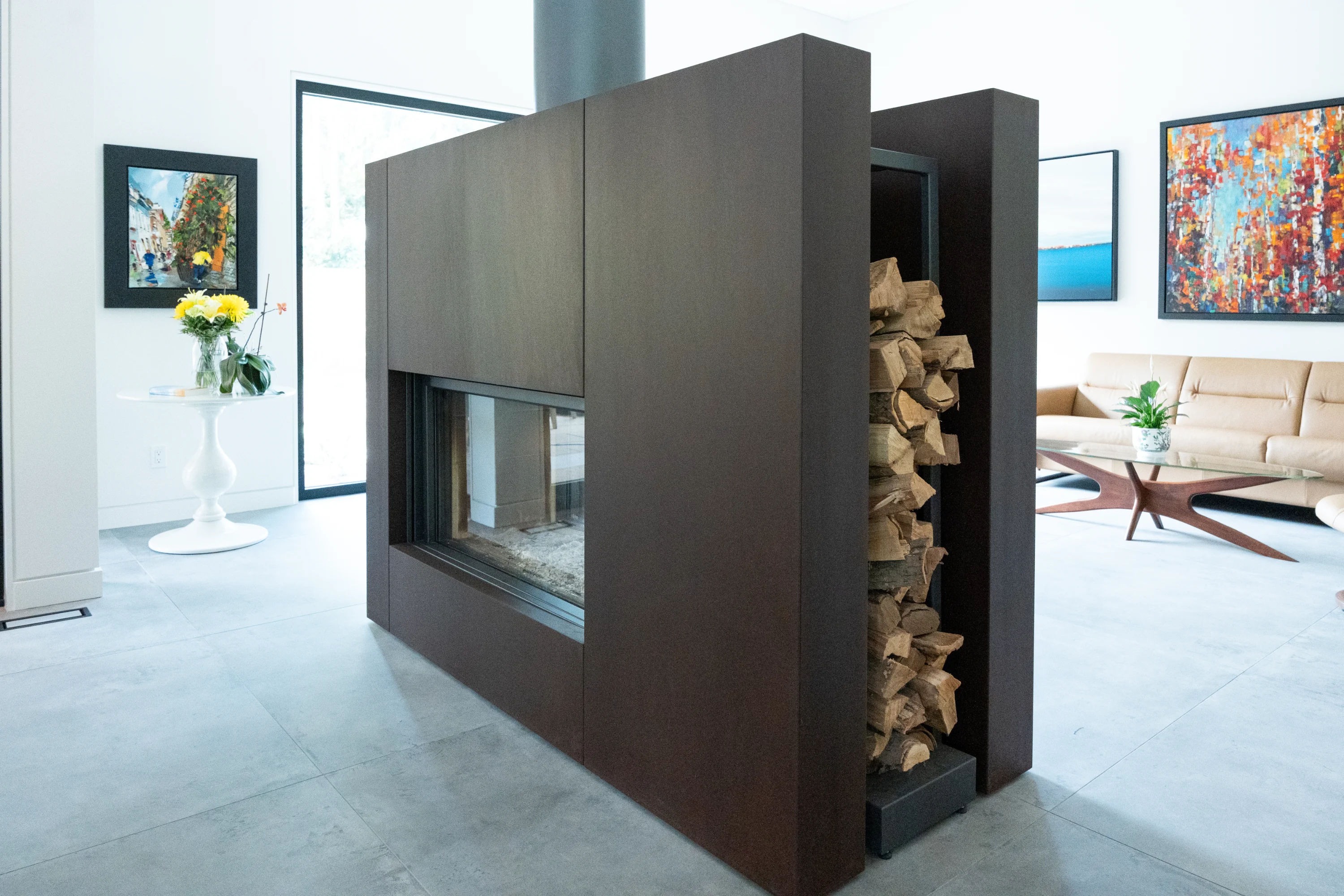 large fireplace in center of living room