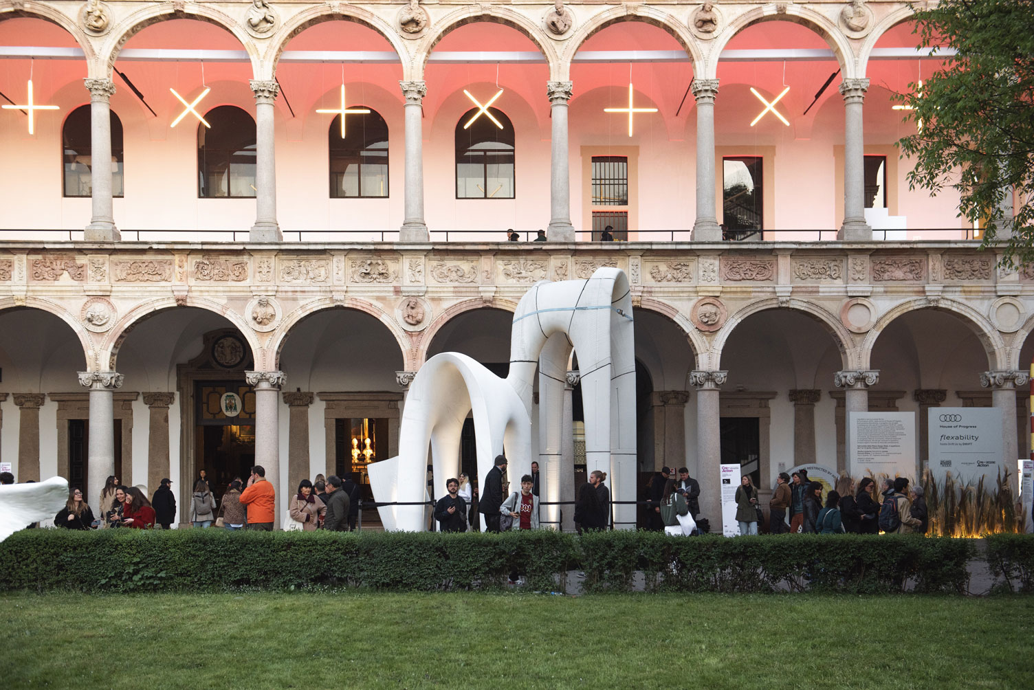 3D concrete printing exhibition in historic courtyard with sculptural white installation