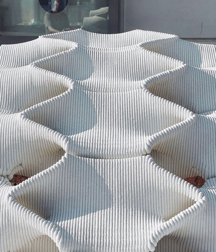 3D concrete printing con creates unique wavy textured architectural surface design