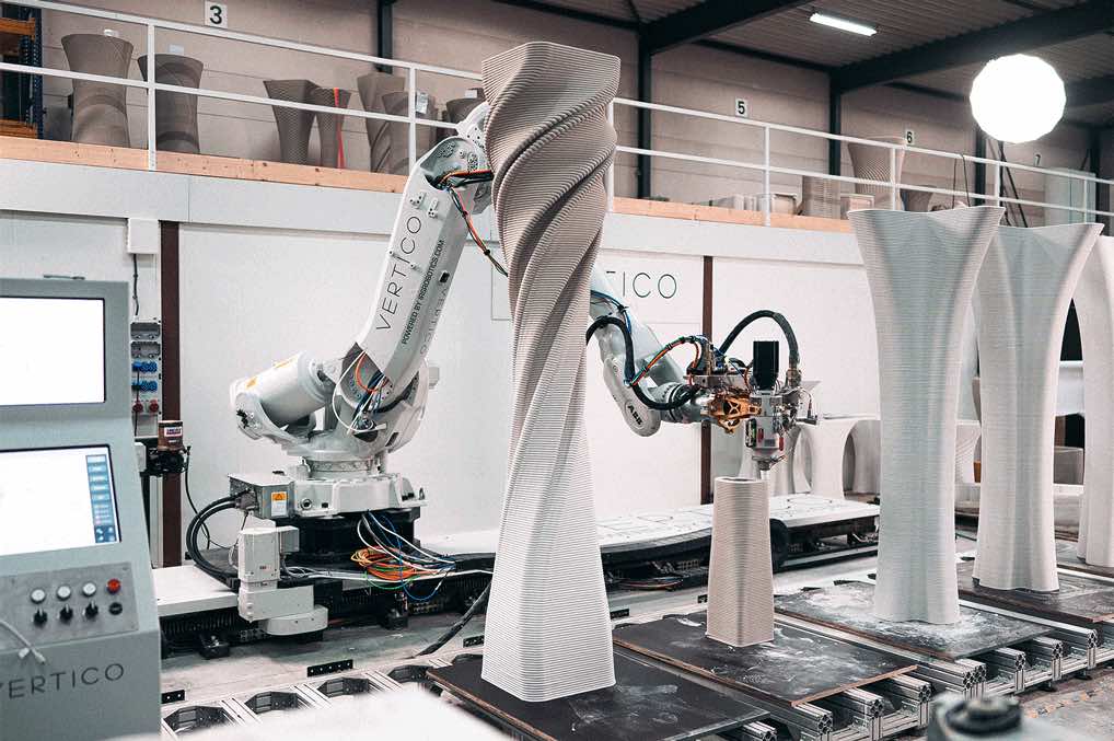 3D concrete printing robot creating tall sculptural architectural structures