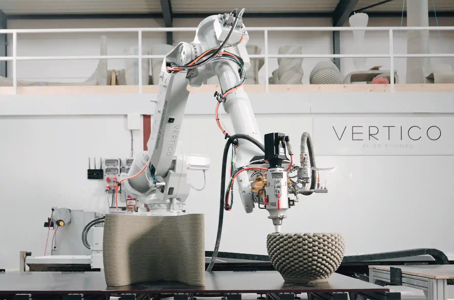 Vertico 3D concrete printing robot creating textured geometric objects