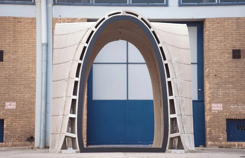 White arched architectural doorway frame against blue door and brick wall