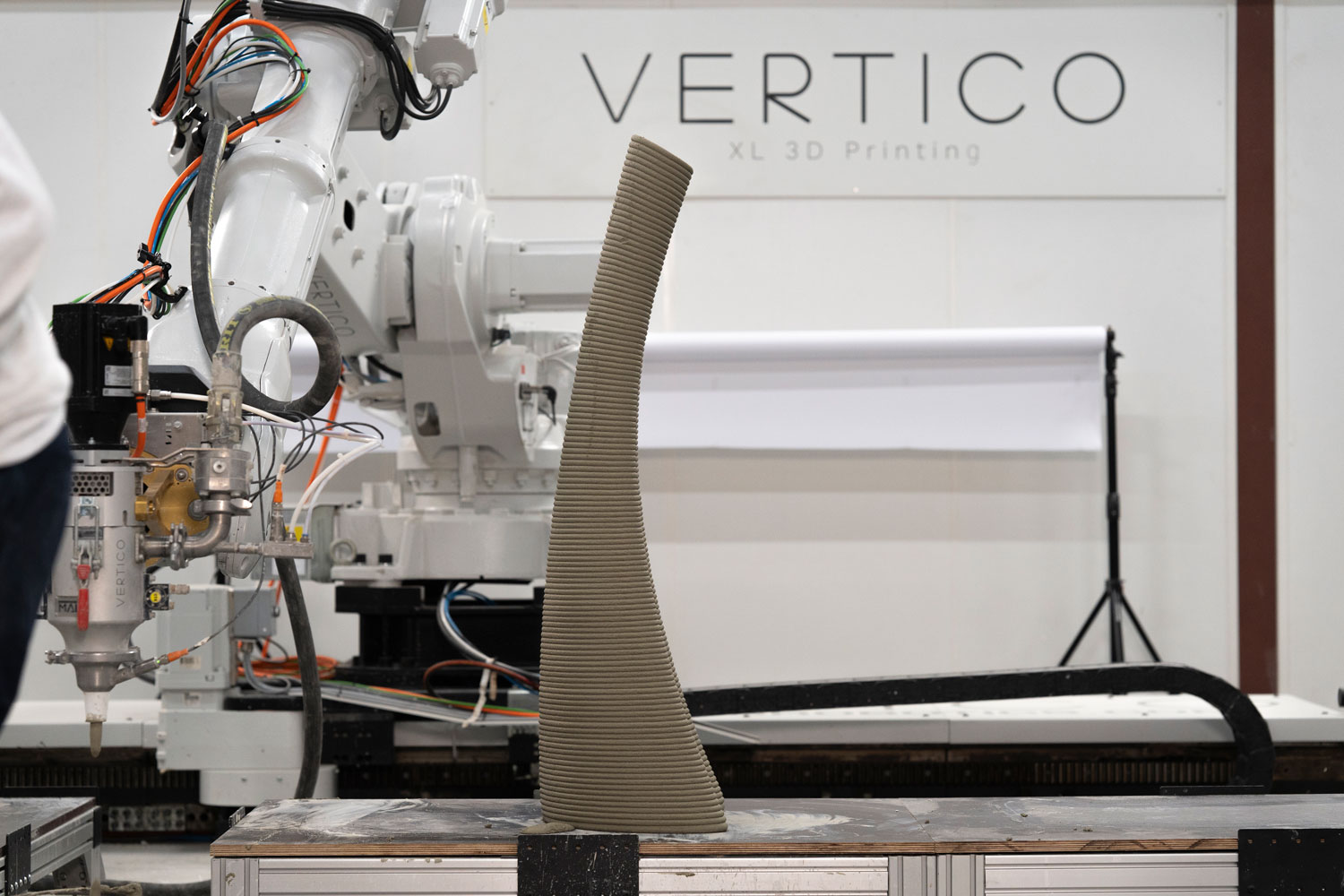 Vertico 3D concrete printing robot creating curvy sculptural object