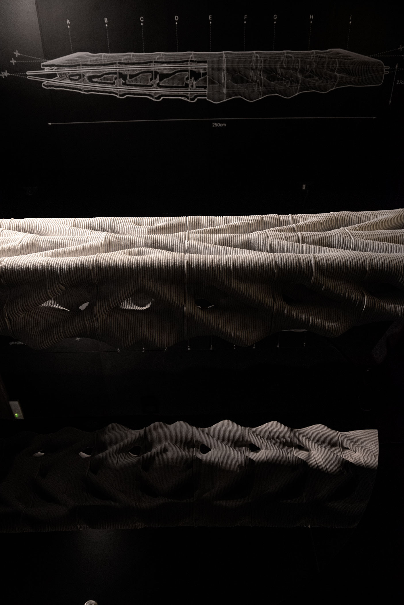 Concrete 3D printing project with layered architectural design wireframe