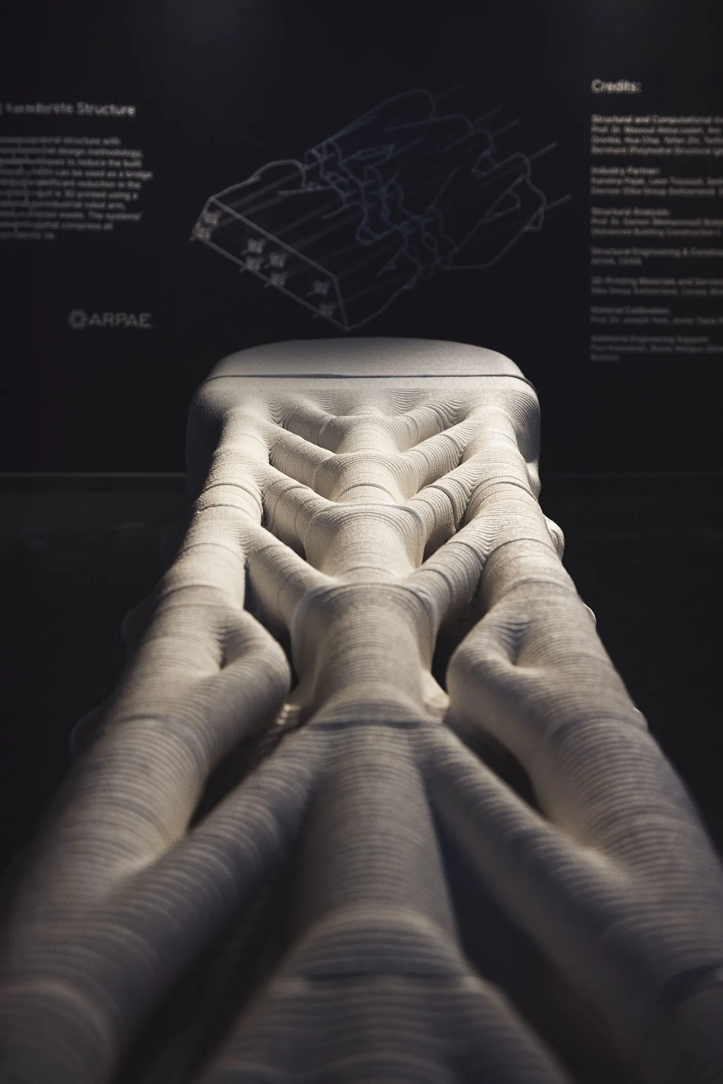 3D printed concrete structure with wavy, organic architectural project design