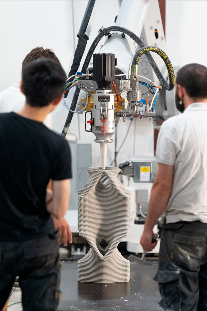 3D printing robot creating intricate geometric sculpture in laboratory