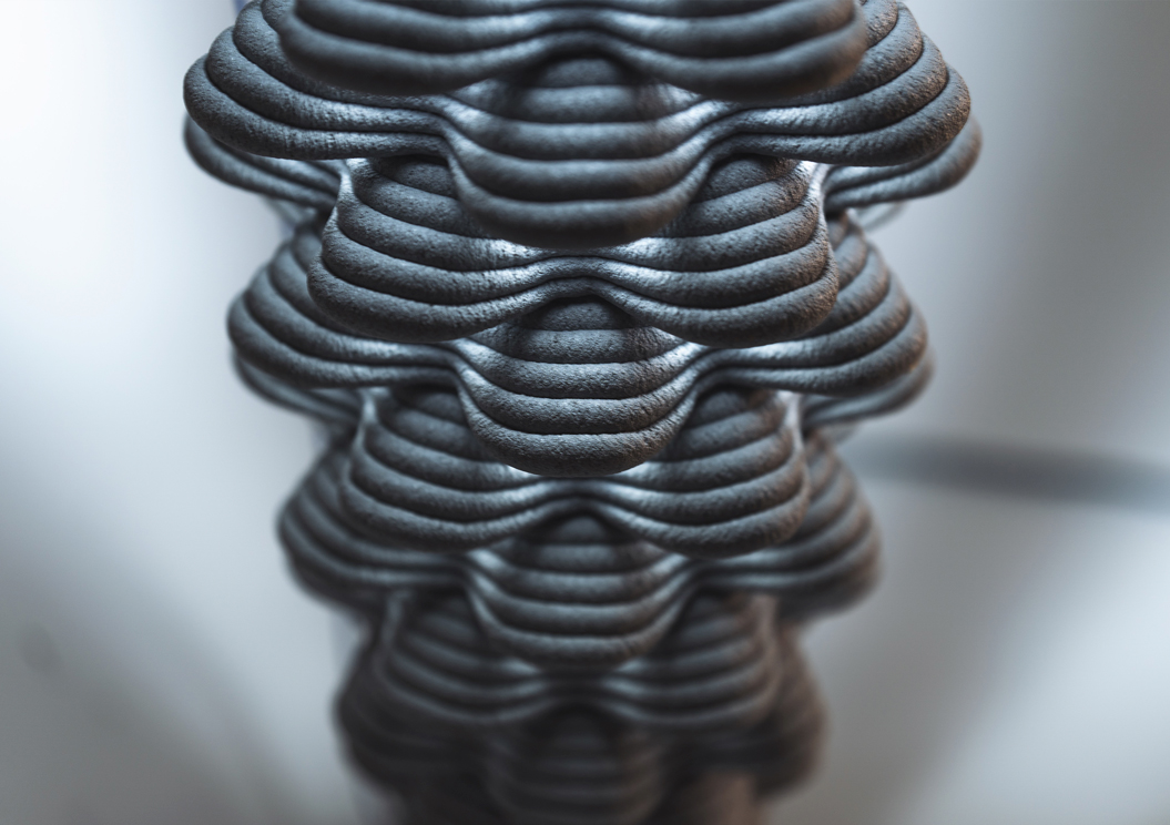 Layered 3D concrete printing showcasing intricate topographic-like design