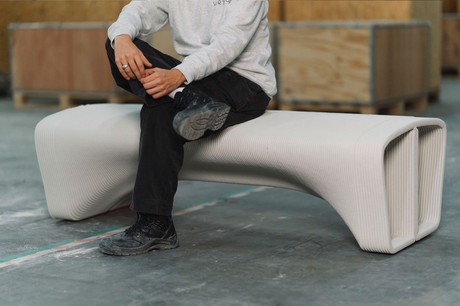 3D concrete printing project showcasing innovative white curved bench design