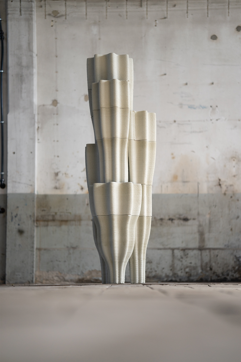 3D printed concrete sculpture with layered vertical architectural design