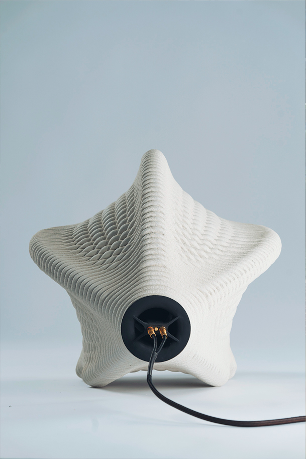 3D printed concrete sculpture with organic shape and electronic connection