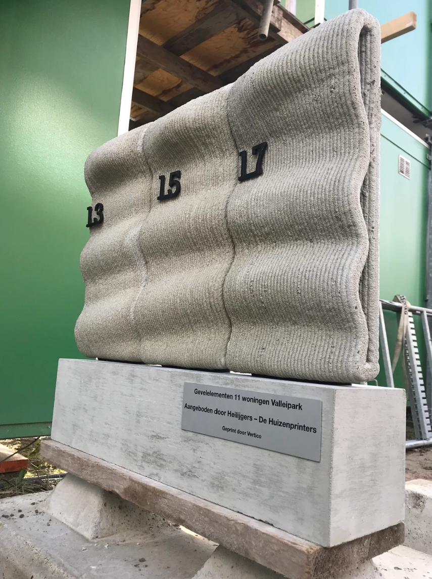 3D concrete printing project with textured facade element and numbered segments