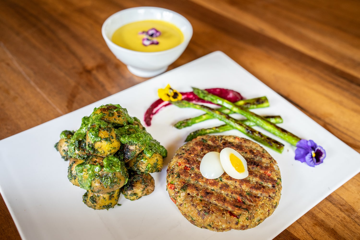 Peruvian-style food on a white clear dish, healthy, organic, and clean.