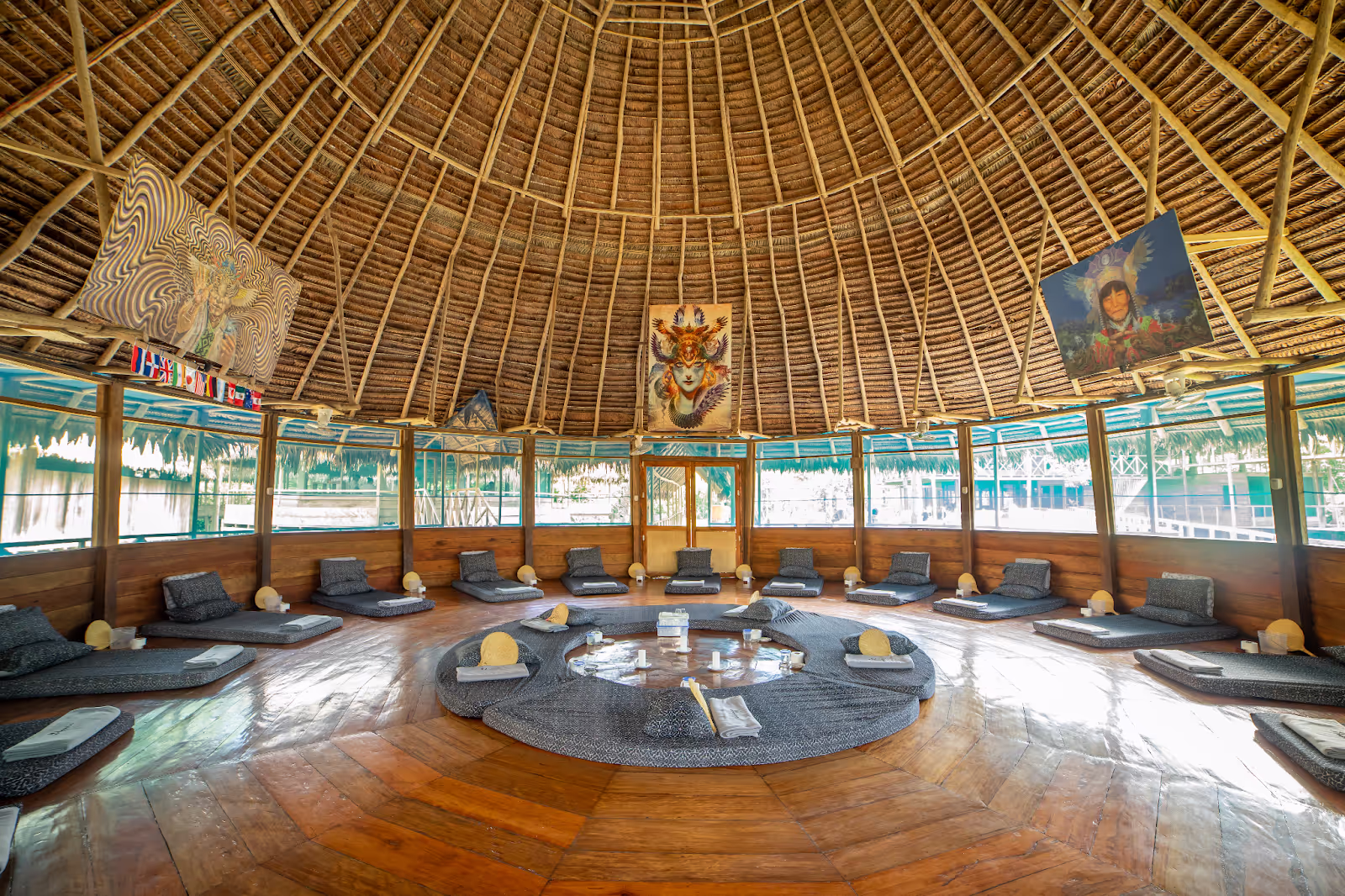 Arkana's ceremony maloka prepared for the evening, with candles on the central altar and cushions in a circle