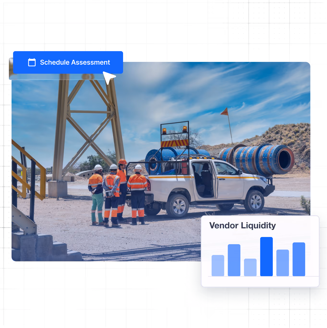 Group of workers in safety gear near a white truck and machinery under a blue sky.