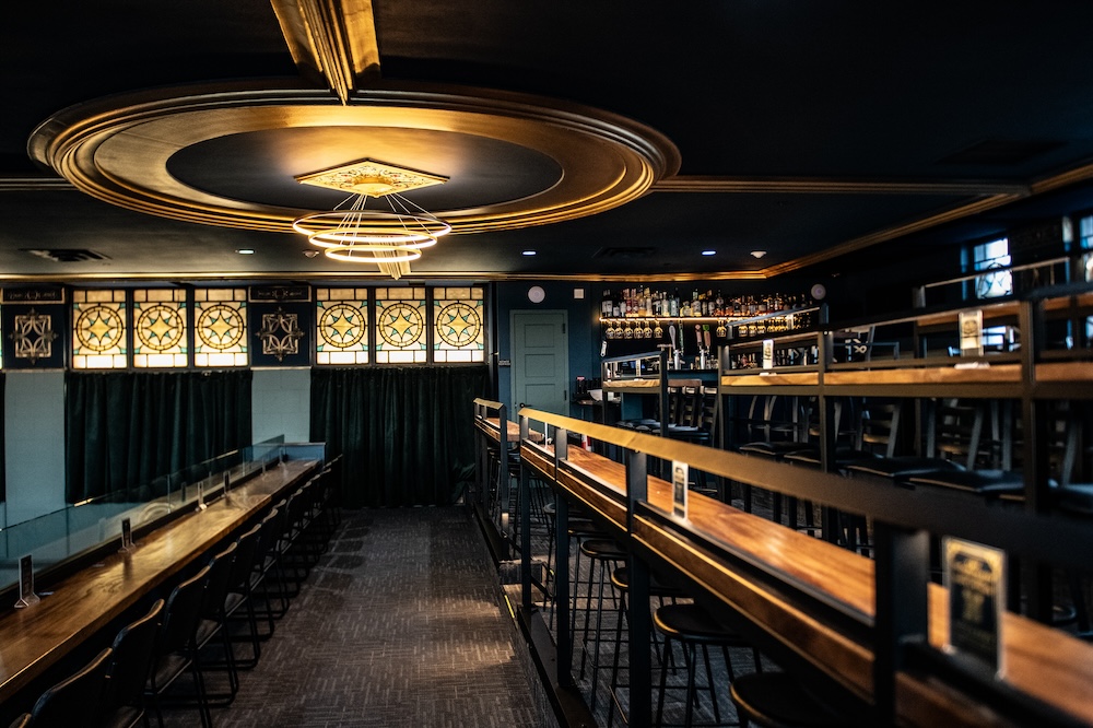 The mezzanine drink rail at The Caz at night