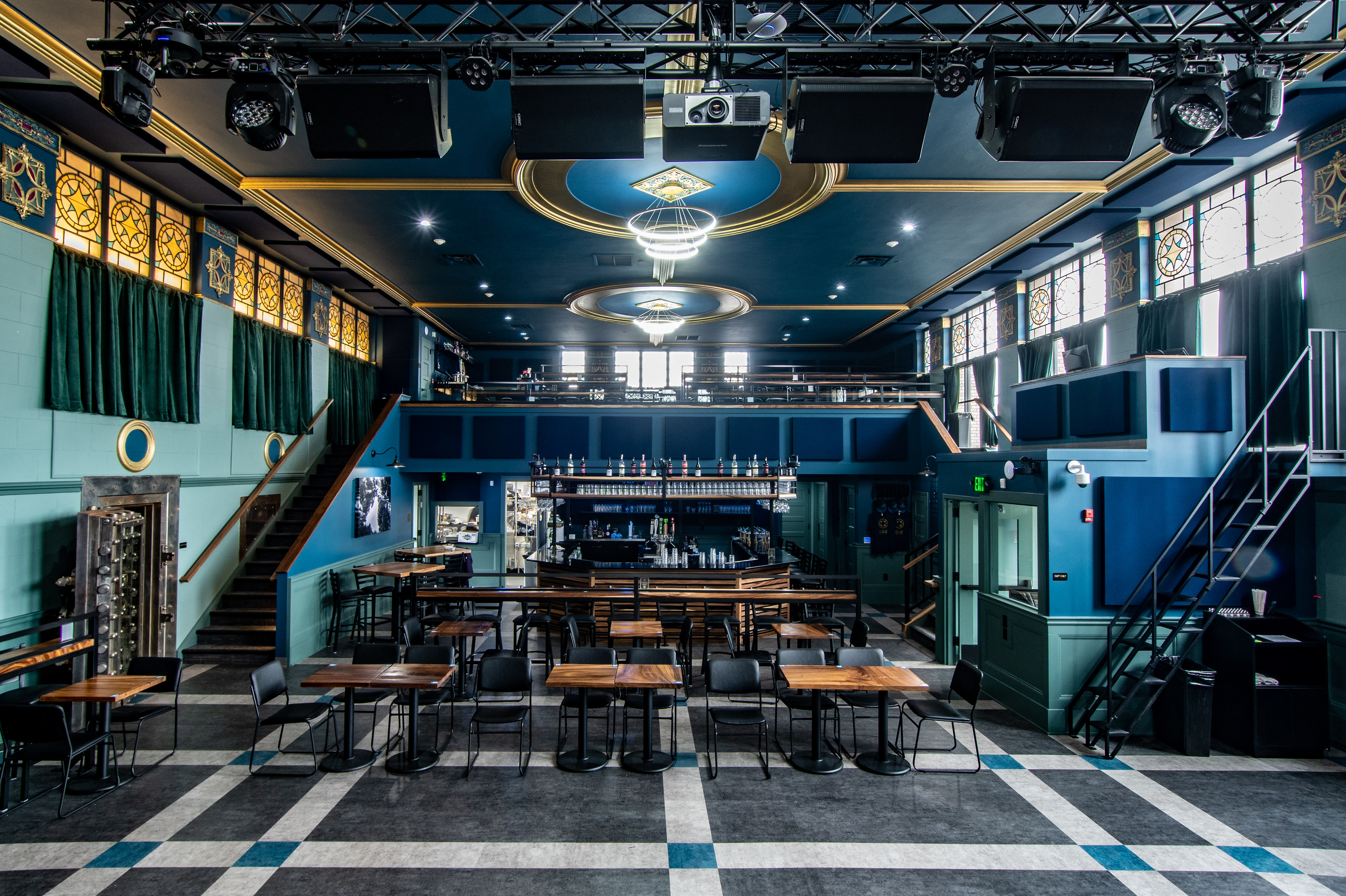 The Caz main floor dining area and bar seen from the stage