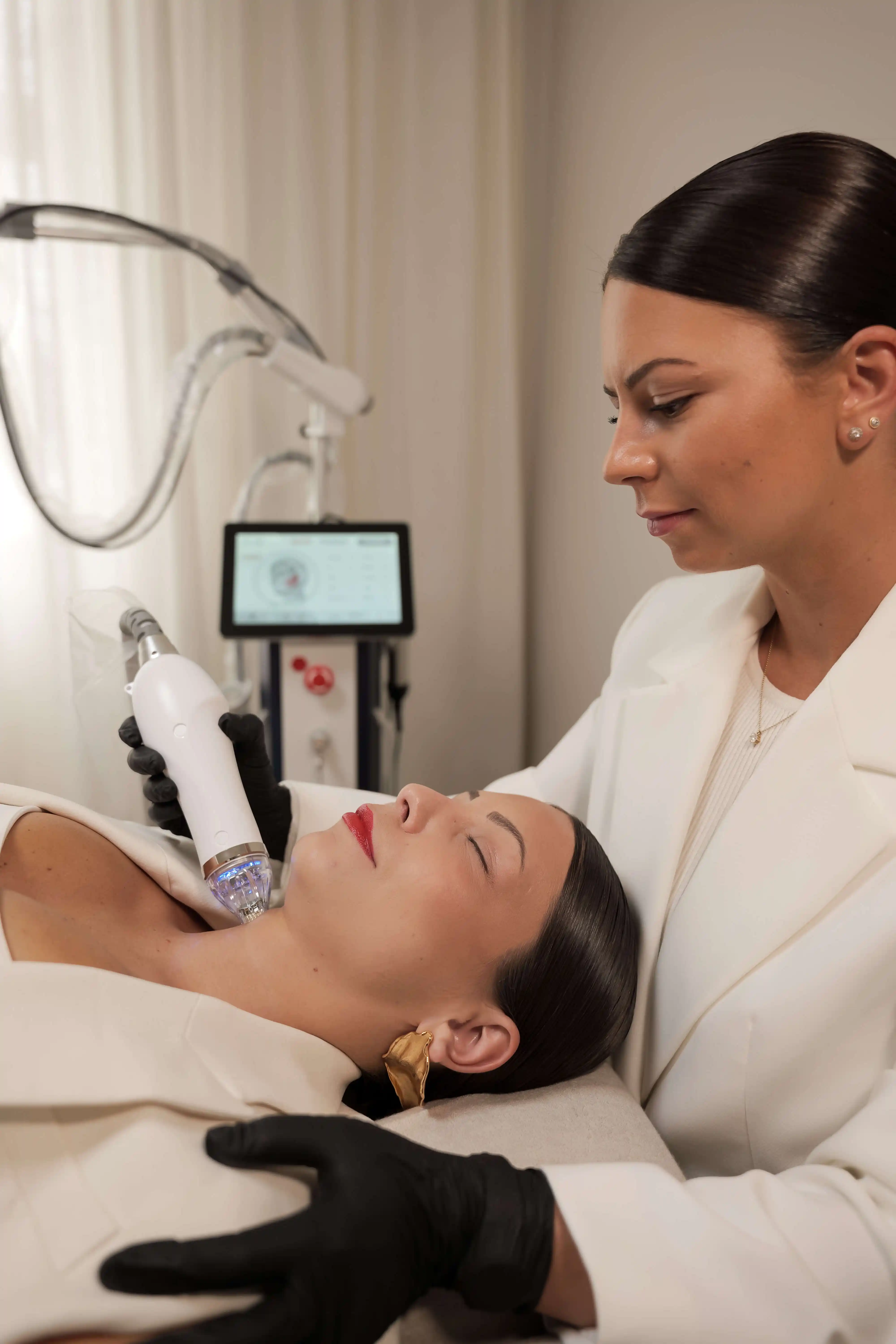 woman getting a facial lift in a beauty salon