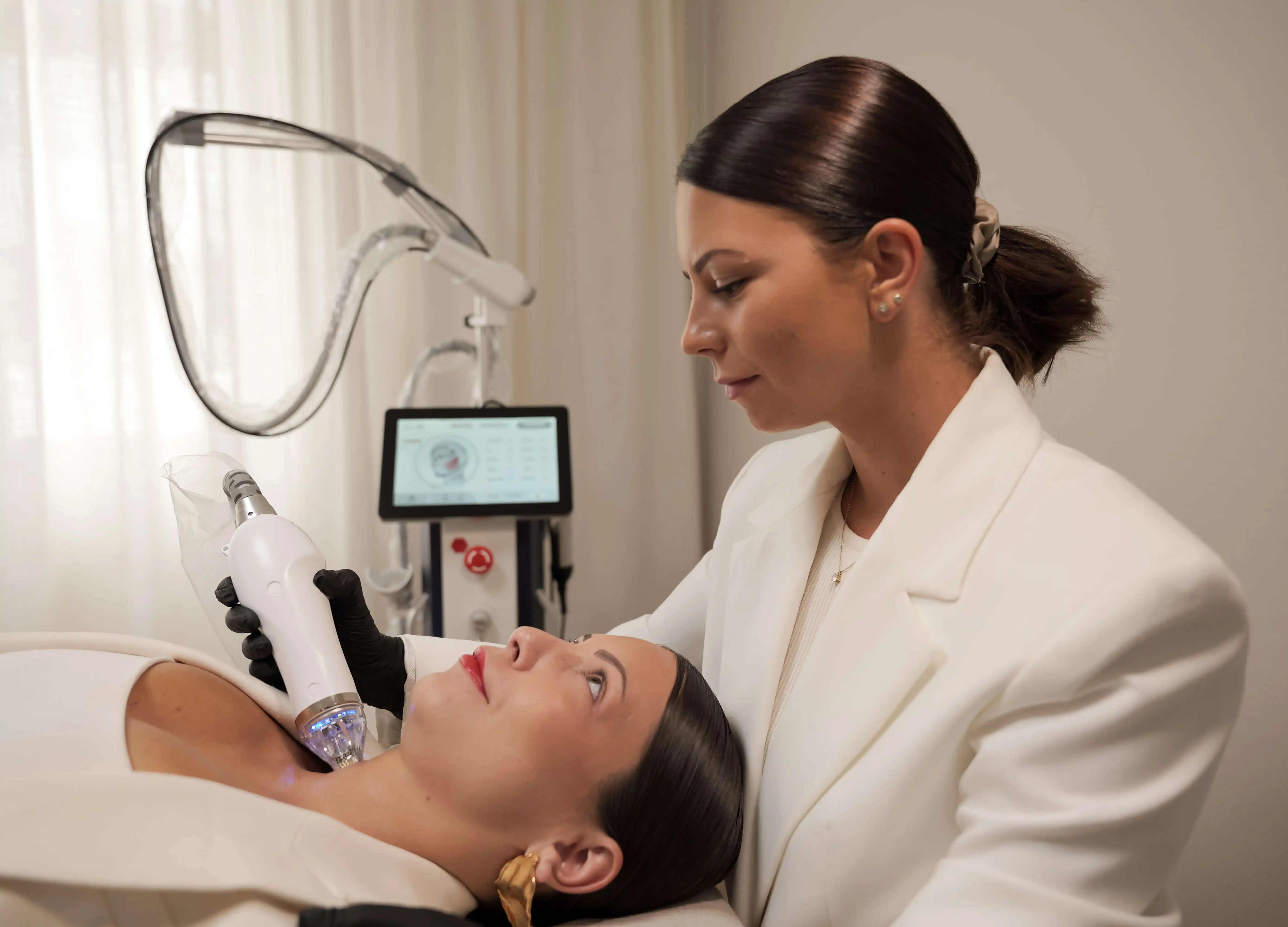woman getting a facial lift in a beauty salon