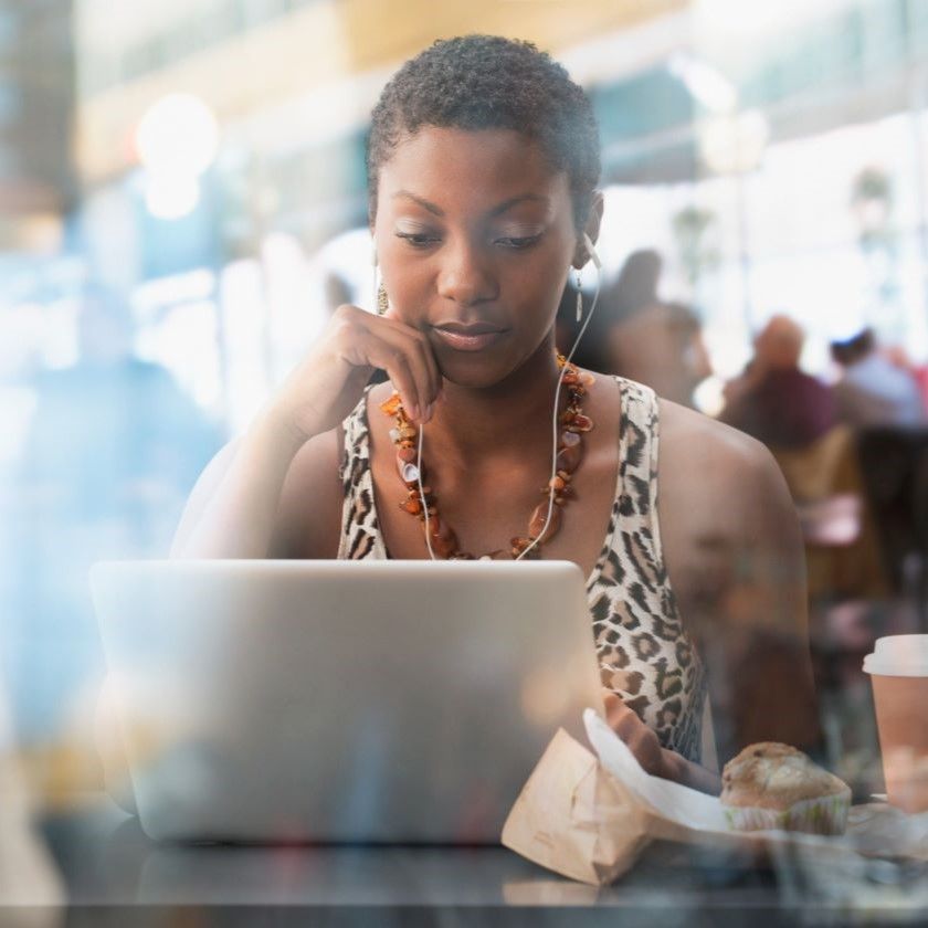 A person views laptop screen, reflecting on digital privacy and information security.