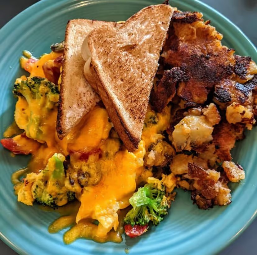 New York Pickle Deli's Food dish with vegetables and toast