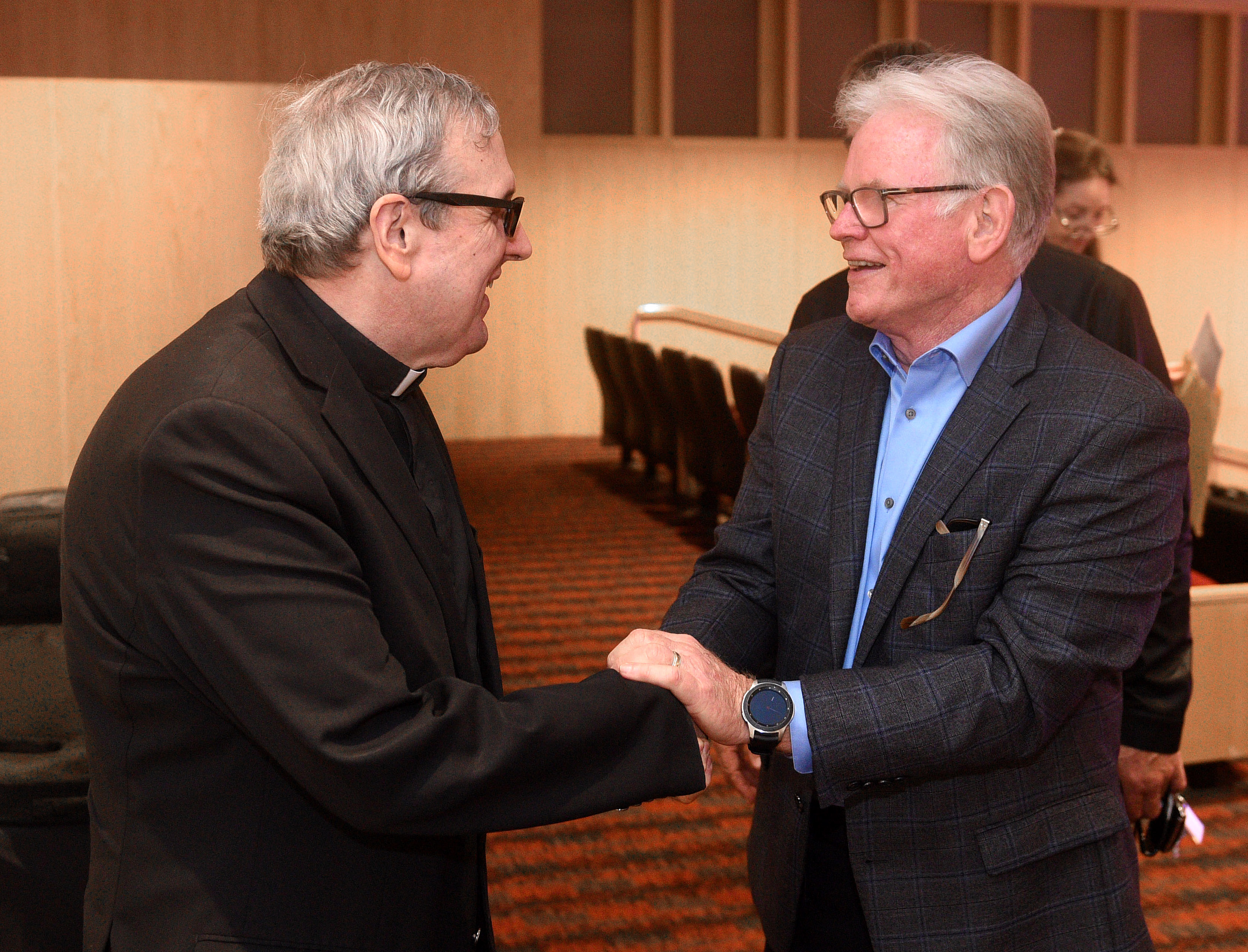Fr. Robert Spitzer (left) and Hank Evers (right) worked together on projects that involved the intersection of faith and science.
