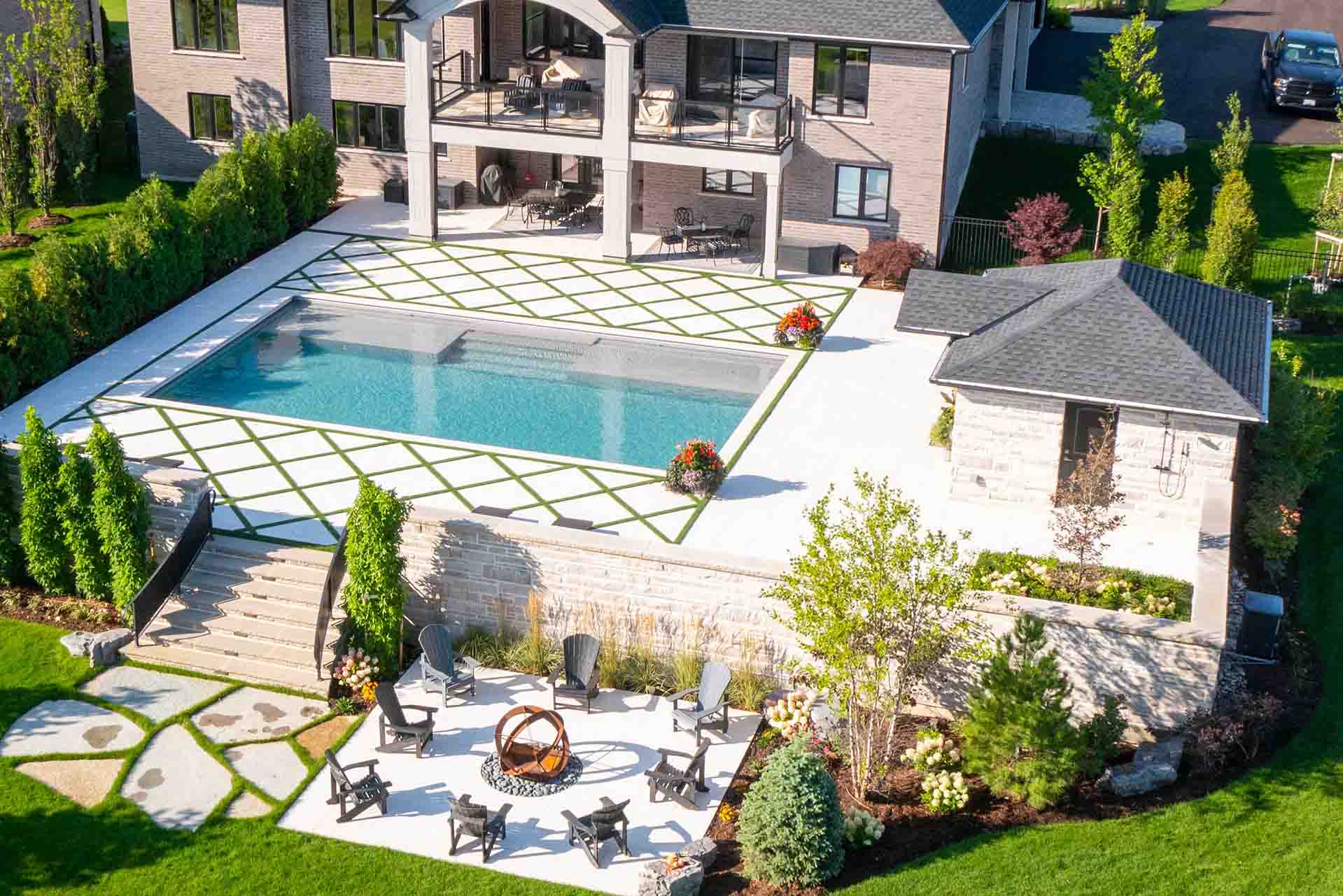 Backyard oasis landscape design and construction of a cohesive layout.