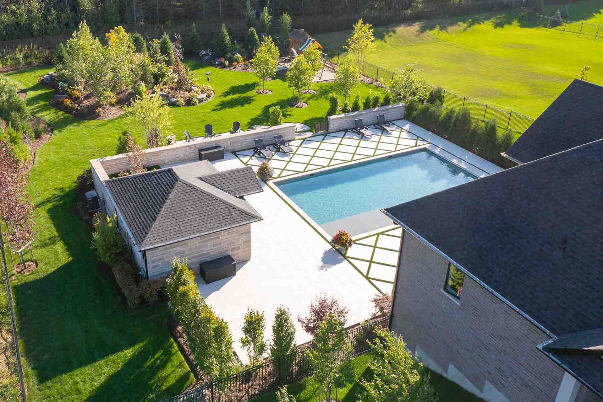 Elegant in-ground pool designed for relaxation and outdoor entertaining.