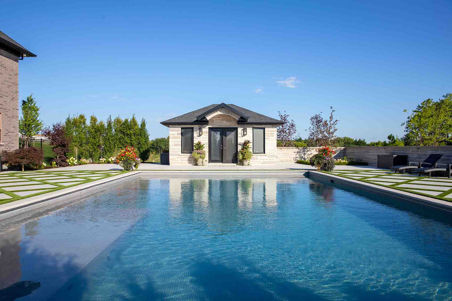 Elegant in-ground pool designed for relaxation and outdoor entertaining.