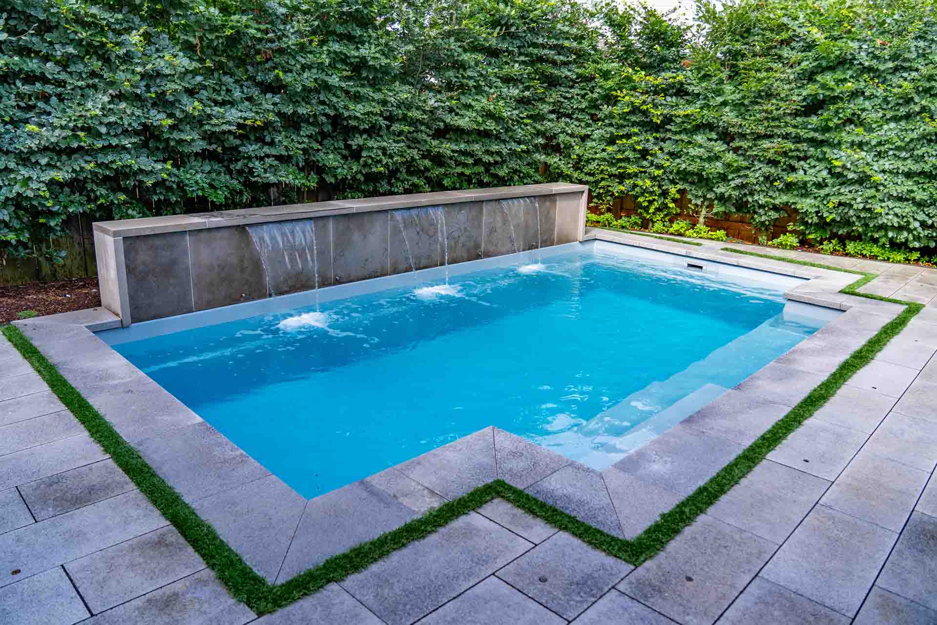 Custom pool installation with full landscape integration.