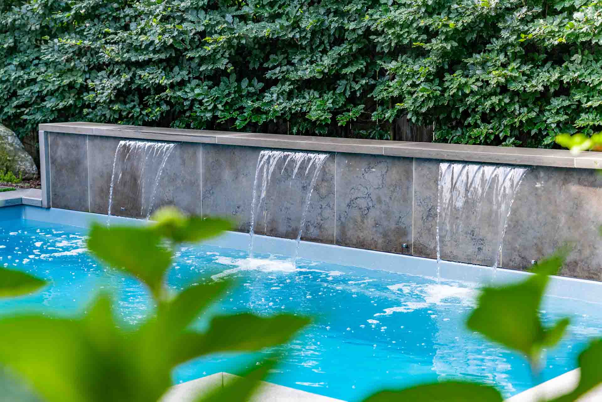 Custom pool installation with full landscape integration.