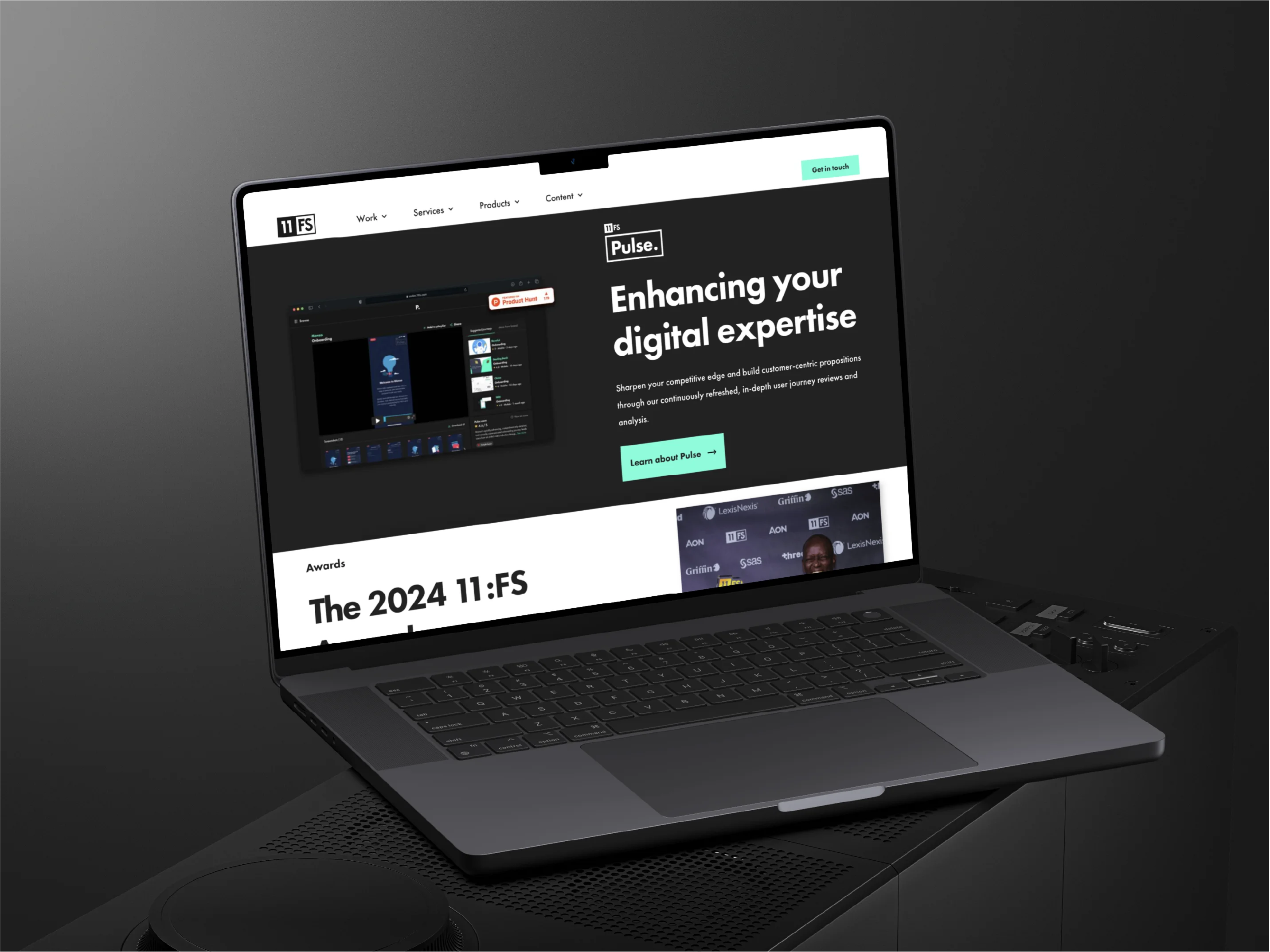 Open laptop displaying a webpage with the heading 'Enhancing your digital expertise' on a dark background.