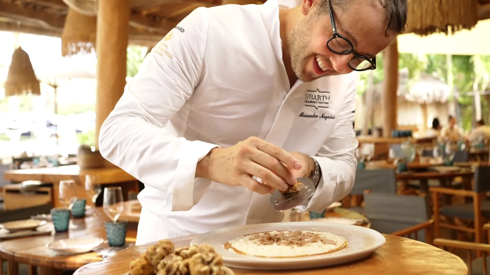 Chef plating a dish at a restaurant