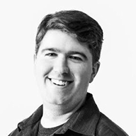 black and white headshot of jamieson roberts senior front end developer for saxx underwear