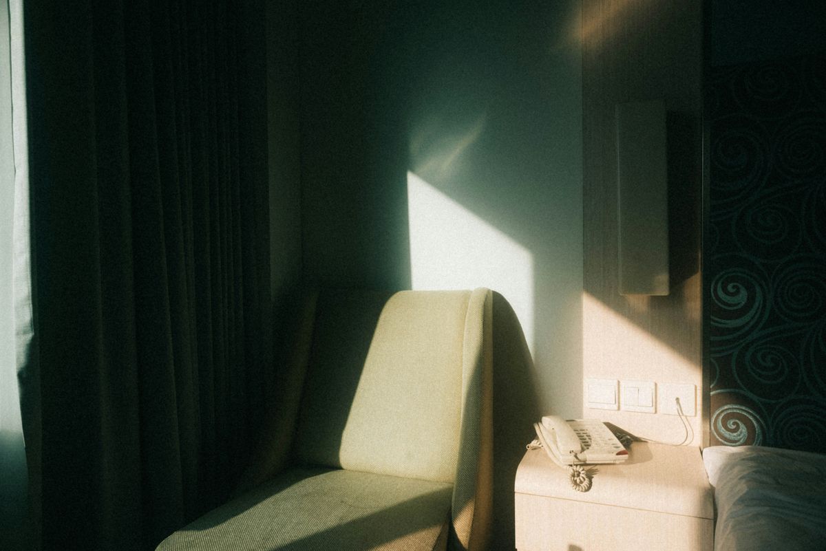 Relaxing spa atmosphere with candles and soft lighting in a treatment room