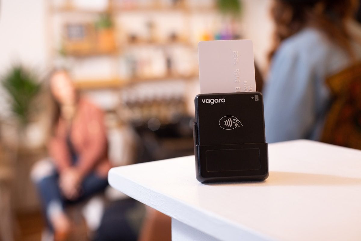 A cell phone sitting on top of a white table