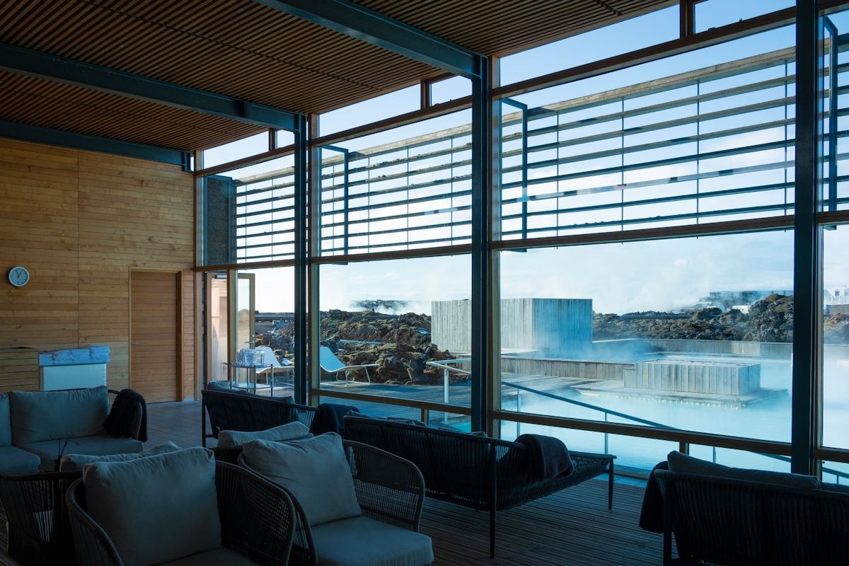 Lounge area overlooking a stunning blue lagoon.