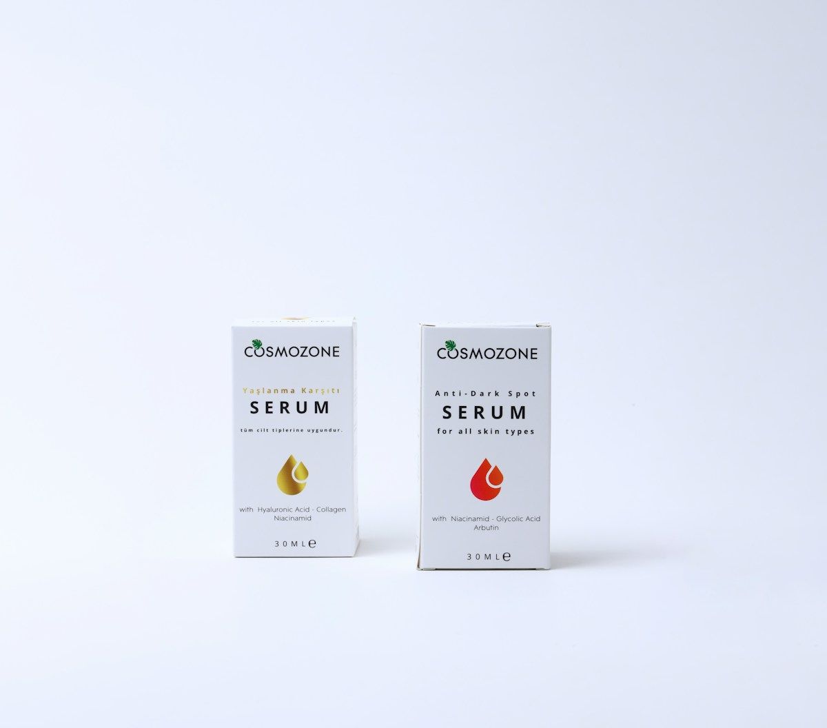 Deux boîtes de sérum cosmétique Cosmozone sur fond blanc.