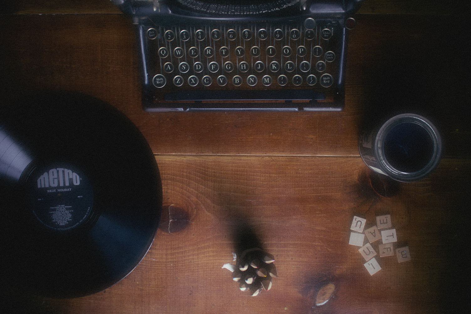 typewriter, vinyl and coffee on the table