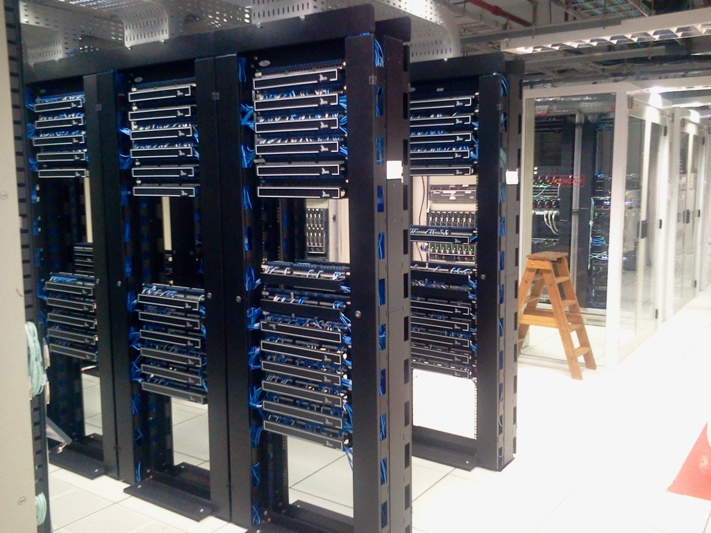 Network racks and patch panels in an equipment room