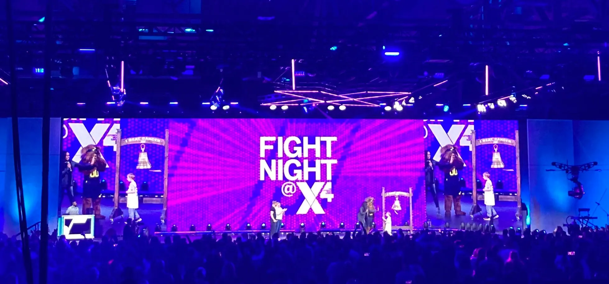 A cancer survivor child ringing the bell to signify his victory