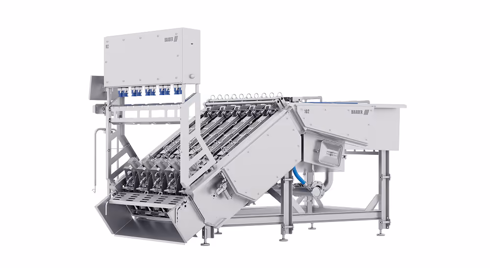 Large industrial Baader 102 machine in gray with angled components and multiple mechanical parts.