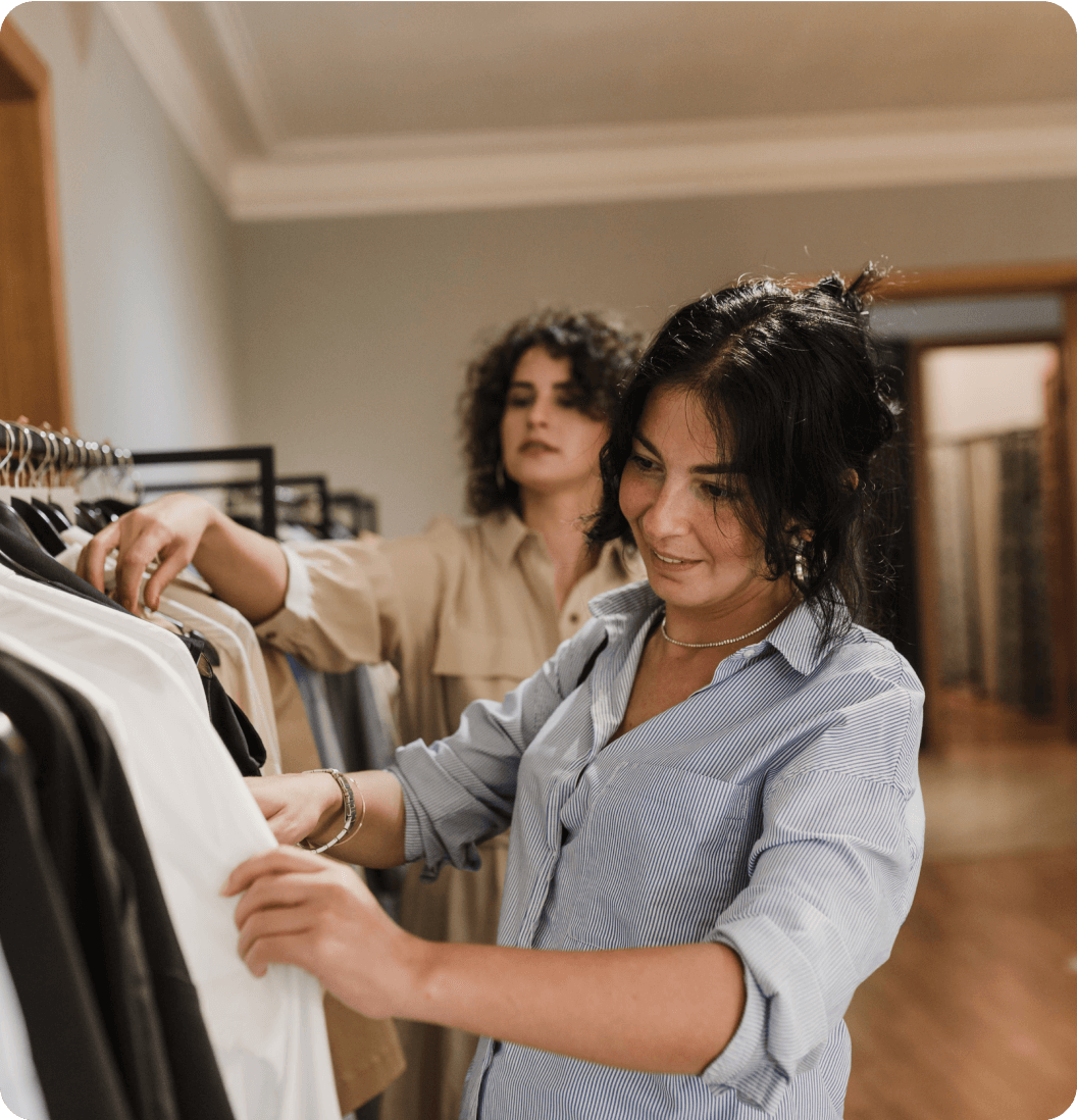 two women shopping for clothes