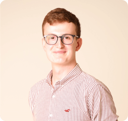 Jonathan wearing glasses and a striped shirt