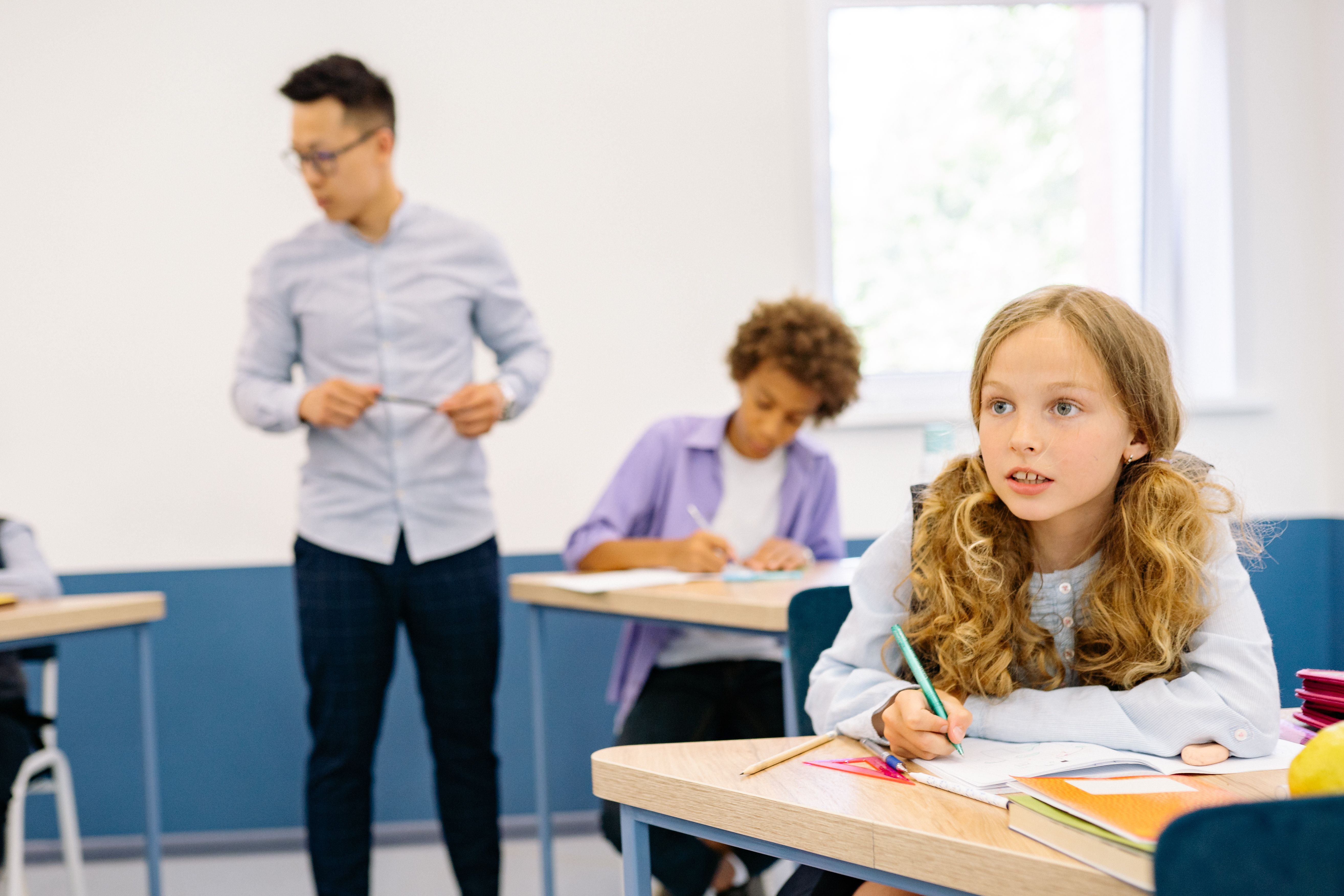 Educator reviewing assessment data and reports