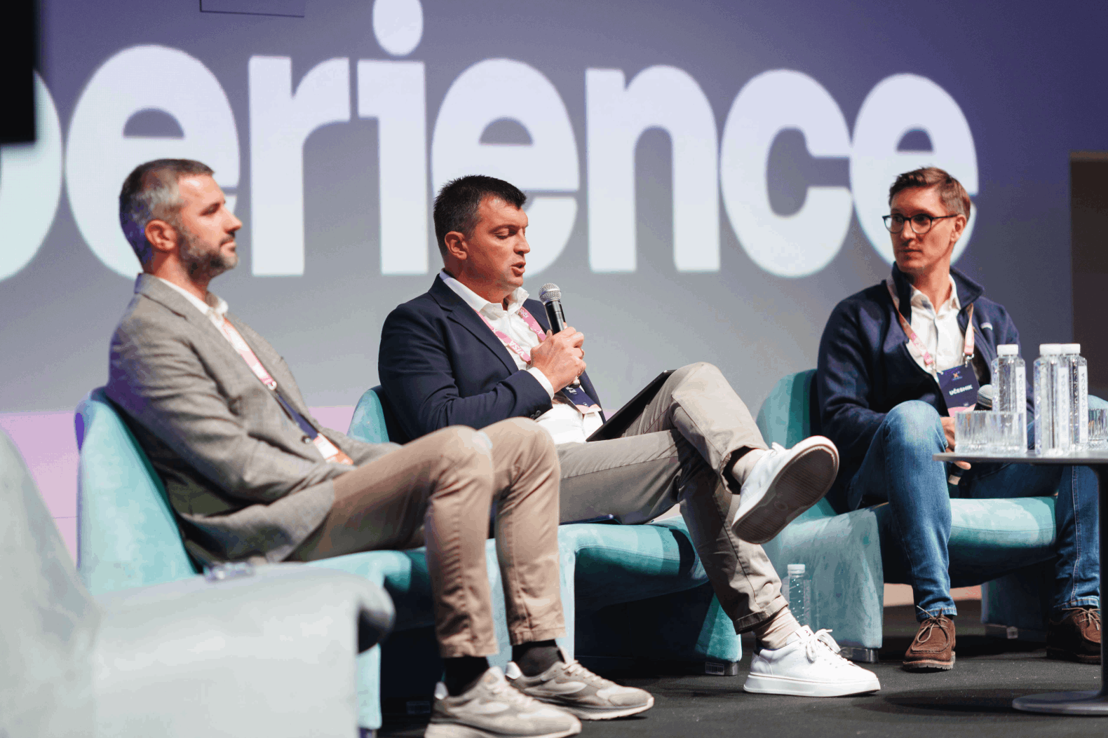 Picture of the three panelists discussing OOH delivery