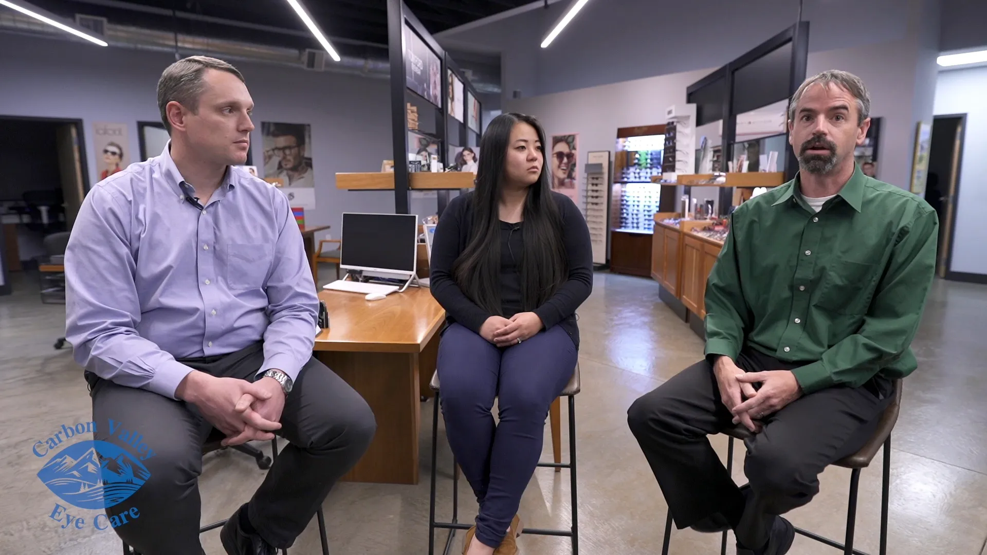 Optometrists sitting down talking about Carbon Valley Eye care