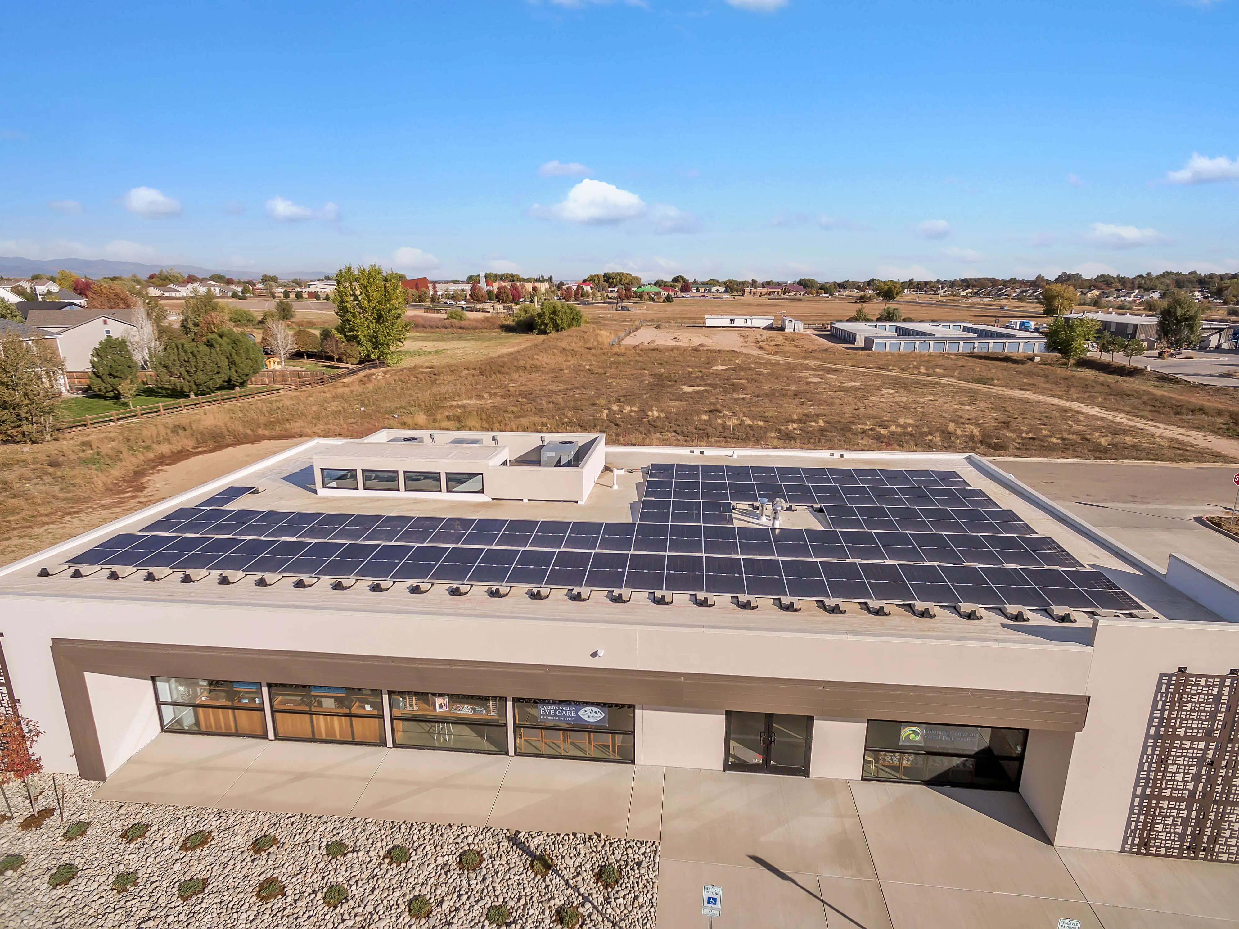 Overhead shot of Carbon Valley Eye Care with solar panels on roof